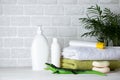 Baby bath amenities, towel, green rubber crocodile and shampoo bottles. The concept of child care Royalty Free Stock Photo