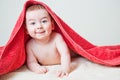 Baby After Bath Under Red Towel on Tummy Royalty Free Stock Photo
