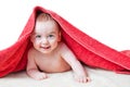 Baby After Bath Under Red Towel on Tummy Smiling Royalty Free Stock Photo