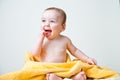 Baby After Bath Wrapped in Yellow Towel Sitting