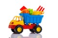 Baby beach sand toys and colorful plastic truck isolated Royalty Free Stock Photo