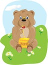 Baby Bear Eating Honey Royalty Free Stock Photo