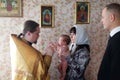 Baby being baptized at Orthodox church