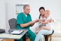 Baby being checked by a doctor Royalty Free Stock Photo