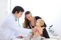 Baby being checked by doctor using stethoscope Royalty Free Stock Photo