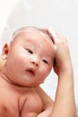 Baby being shampooed Royalty Free Stock Photo