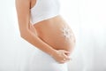 Baby Belly Skin Care. Pregnant Woman With Cream Sun On Skin Royalty Free Stock Photo