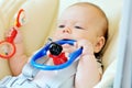 Baby biting toy Royalty Free Stock Photo