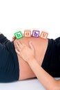 Baby Blocks On Stomach Royalty Free Stock Photo