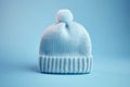 Baby blue knitted warm woolen hat with pompon