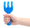 Baby blue rake sandbox toys in hand Royalty Free Stock Photo