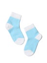 Baby blue and white socks isolated on white background Royalty Free Stock Photo