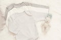 Baby Bodysuit Mockup. Styled Stock Photography. Clothes and Bunny Toy For A Boy. Jumpsuits, Rompers On A White Fur Carpet. Newborn