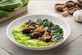 Baby Bok choy or chinese cabbage in mushroom vegetarian sauce with Shitake Mushrooms and fried garlic Royalty Free Stock Photo