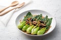 Baby Bok choy or chinese cabbage in oyster sauce with Shitake Mushrooms and fried garlic Royalty Free Stock Photo