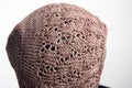 Baby bonnet taupe knit isolated Royalty Free Stock Photo