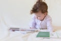 A baby with books. Royalty Free Stock Photo