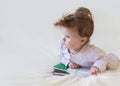 A baby with books. Royalty Free Stock Photo