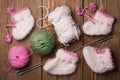 Baby booties with their hands