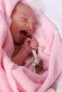 Baby born with silver spoon in her mouth