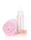 Baby bottle, pacifier and towel Royalty Free Stock Photo