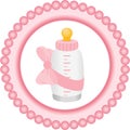 Baby bottle it's a girl round label Royalty Free Stock Photo