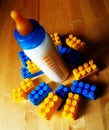 Baby bottle and toys Royalty Free Stock Photo