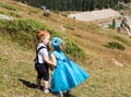 Baby boy and adorable child girl on grass. Summer green nature background. Royalty Free Stock Photo