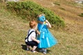 Baby boy and adorable child girl on grass. Summer green nature background Royalty Free Stock Photo