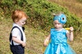 Baby boy and adorable child girl on grass. Summer green nature Royalty Free Stock Photo