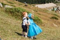 Baby boy and adorable child girl kissing on grass. Summer green nature Royalty Free Stock Photo