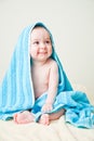 Baby Boy After Bath Wrapped in Blue Towel Sitting Royalty Free Stock Photo