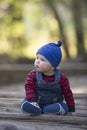 Baby boy with beanie on a glowing Autumn day portrait Royalty Free Stock Photo