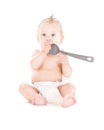 Baby boy with big spoon Royalty Free Stock Photo