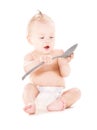 Baby boy with big spoon Royalty Free Stock Photo