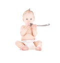 Baby boy with big spoon Royalty Free Stock Photo