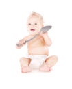 Baby boy with big spoon Royalty Free Stock Photo