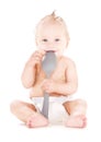 Baby boy with big spoon Royalty Free Stock Photo