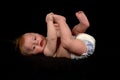 Baby boy with black background