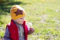 Baby boy blow dandelion, childhood. Spring Royalty Free Stock Photo