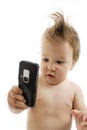Baby boy with cell phone Royalty Free Stock Photo