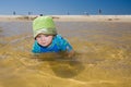 Baby boy child swimming in fun beach water Royalty Free Stock Photo