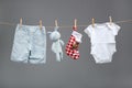 Baby boy clothes with santa bags on the clothesline