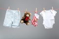 Baby boy clothes with santa bags on the clothesline