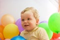 Baby boy with colorful balloons Royalty Free Stock Photo