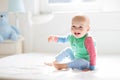 Baby boy crawling on bed Royalty Free Stock Photo