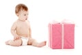 Baby boy in diaper with big gift box Royalty Free Stock Photo