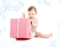 Baby boy in diaper with big gift box Royalty Free Stock Photo