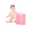 Baby boy in diaper with big gift box Royalty Free Stock Photo