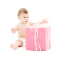 Baby boy in diaper with big gift box Royalty Free Stock Photo